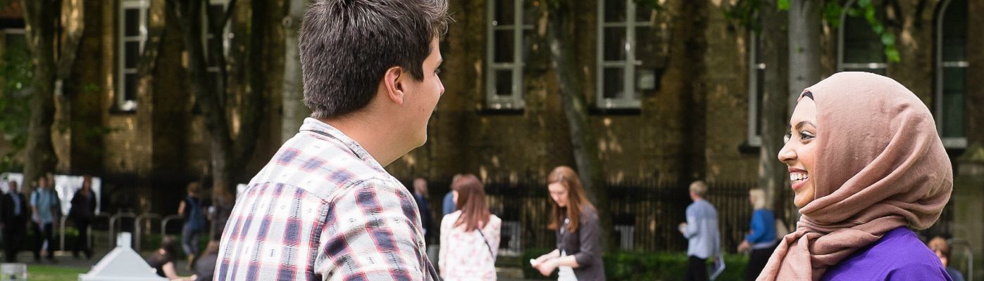 people chatting outdoors